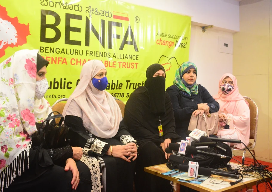 Women coming together at a BENFA community gathering