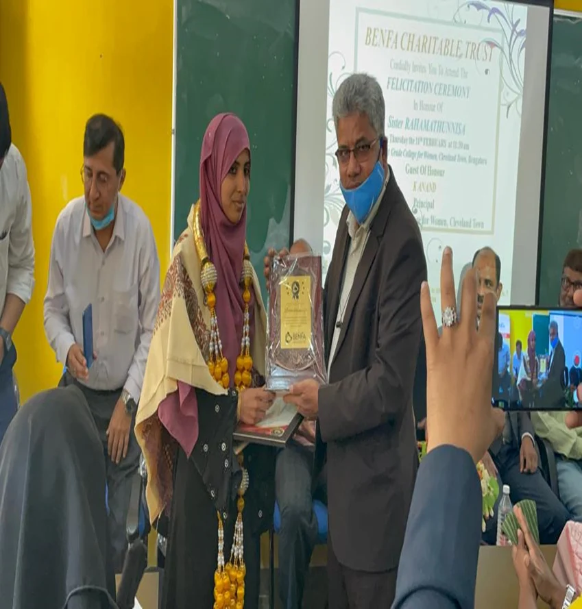 BENFA representatives meet a community member