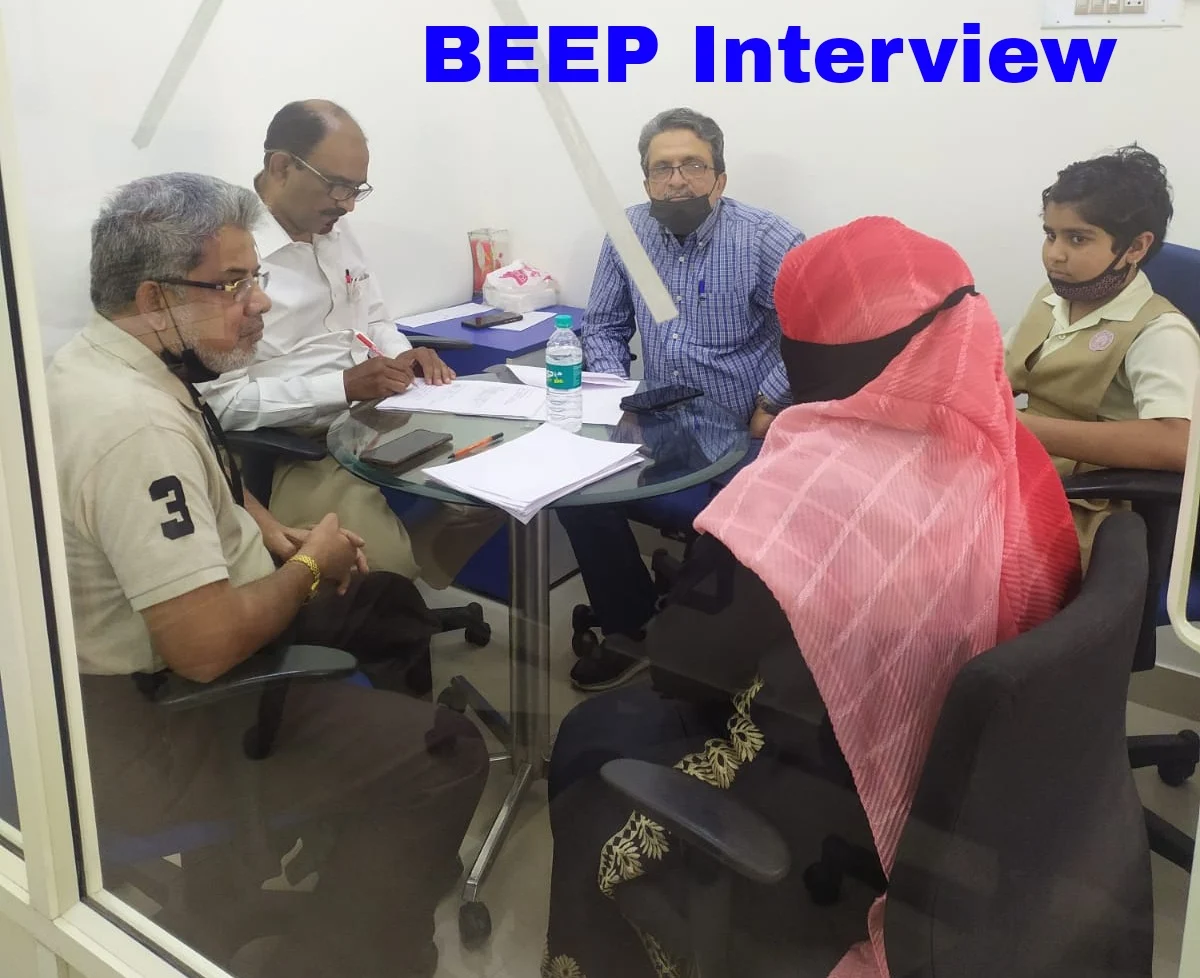 A student and family meet with the BEEP scholarship committee